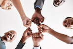 Diversity, hand, or fist group of business people trust, unite and support at work. Below view of happy corporate professional team hands touching showing success and collaboration in startup office