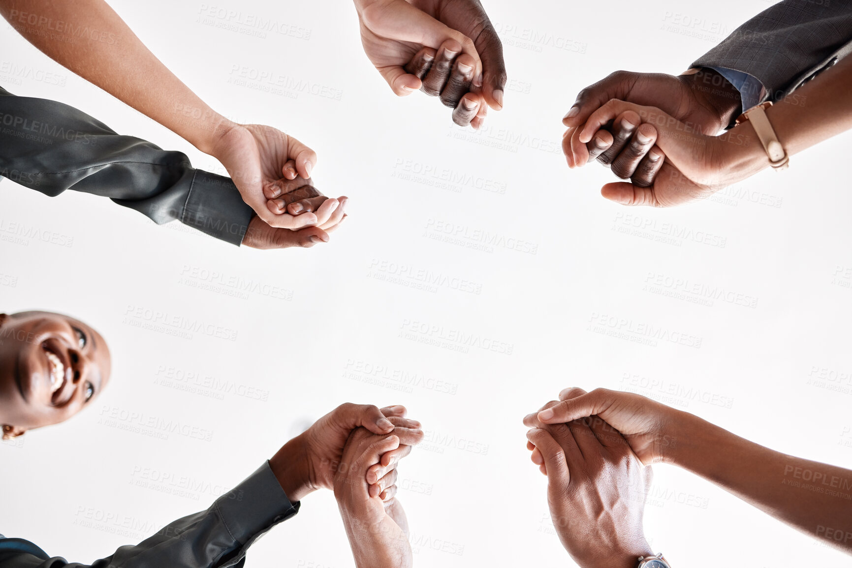 Buy stock photo Diversity, support and collaboration of business people holding hands below in trust for company success. Team of corporate workers in a circle of success in a meeting together at a corporate company