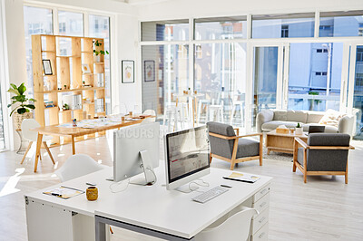 Buy stock photo Empty office room, workplace or interior with an arranged desk, computers and furniture. Corporate organized work space, business company working area or modern headquarters workspace