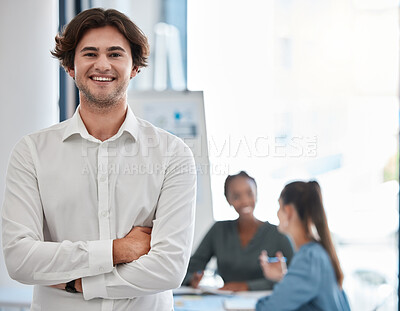 Buy stock photo Leadership, manager and smile of a young man standing with arms crossed in a boardroom meeting for motivation, innovation and success. Confident, happy and professional entrepreneur at the office
