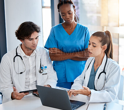 Buy stock photo Teamwork, doctors and collaboration on laptop during a meeting in a conference room. Diverse healthcare workers discussing modern treatment and innovation, brainstorming to find a cure for sickness 