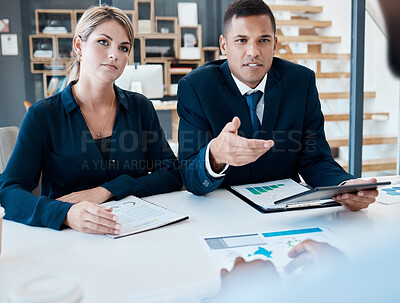 Buy stock photo Interview, human resources and hiring with a business man and woman in a meeting for recruitment and training. Teamwork, negotiation and proposal with businesspeople talking in the office boardroom