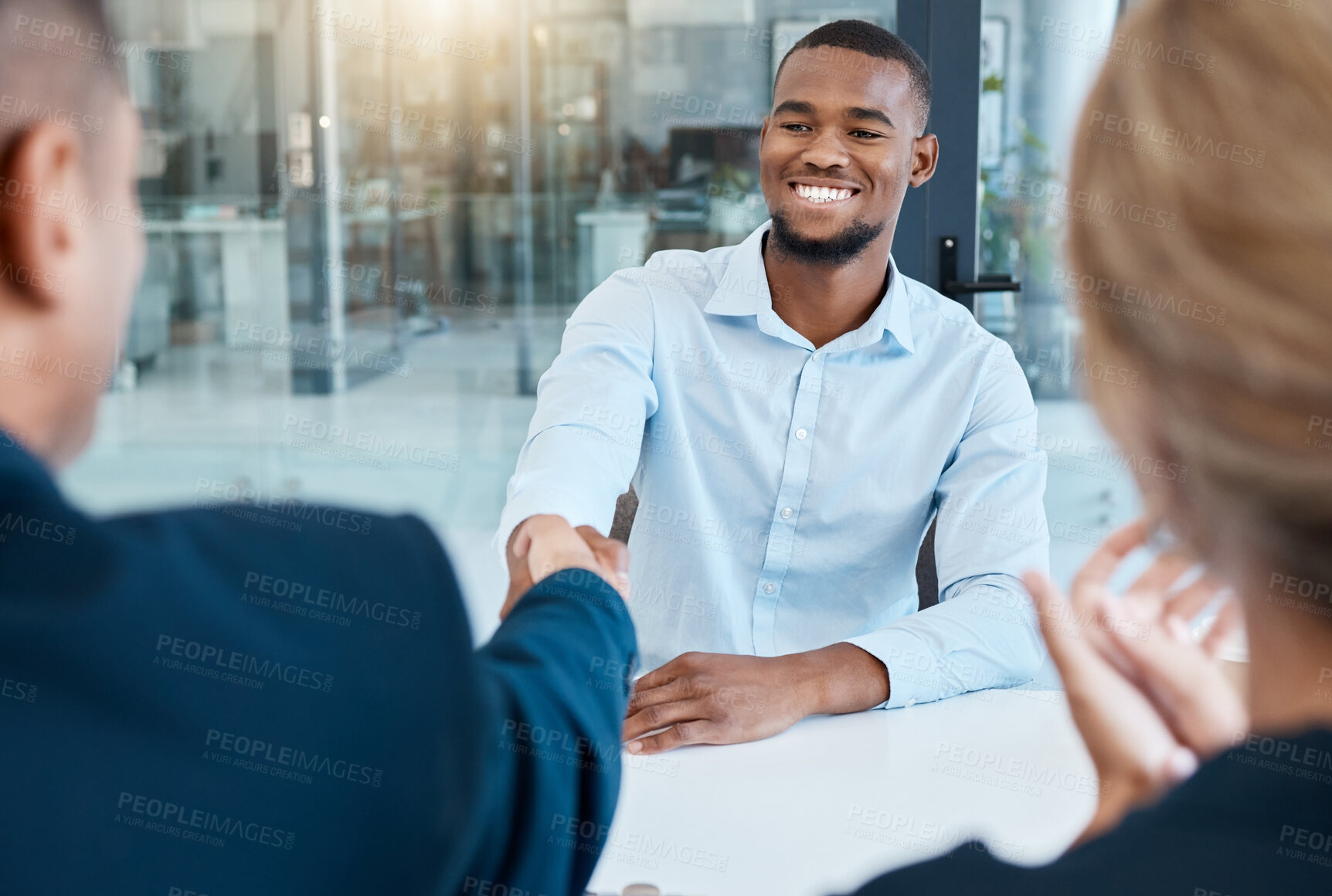 Buy stock photo Shaking hands, interview and business people give a handshake after hiring a new company employee. Onboarding, thank you and management welcome young African worker a job promotion in office meeting
