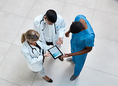 Buy stock photo Doctor, nurse and healthcare team with a tablet working with digital medical data in a hospital. Technology, tech and internet information of health and wellness clinic workers planning a surgery 