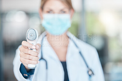 Buy stock photo Thermometer, covid face mask and doctor check temperature for hospital policy or compliance with bokeh. Medical healthcare worker with scan device for corona virus disease detection POV or portrait