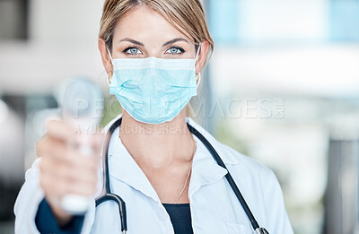 Buy stock photo Doctor, covid and mask of a woman with thermometer pointing to check patient health status at a hospital. Medical, healthcare and clinic female worker with a scanner testing people for virus or fever