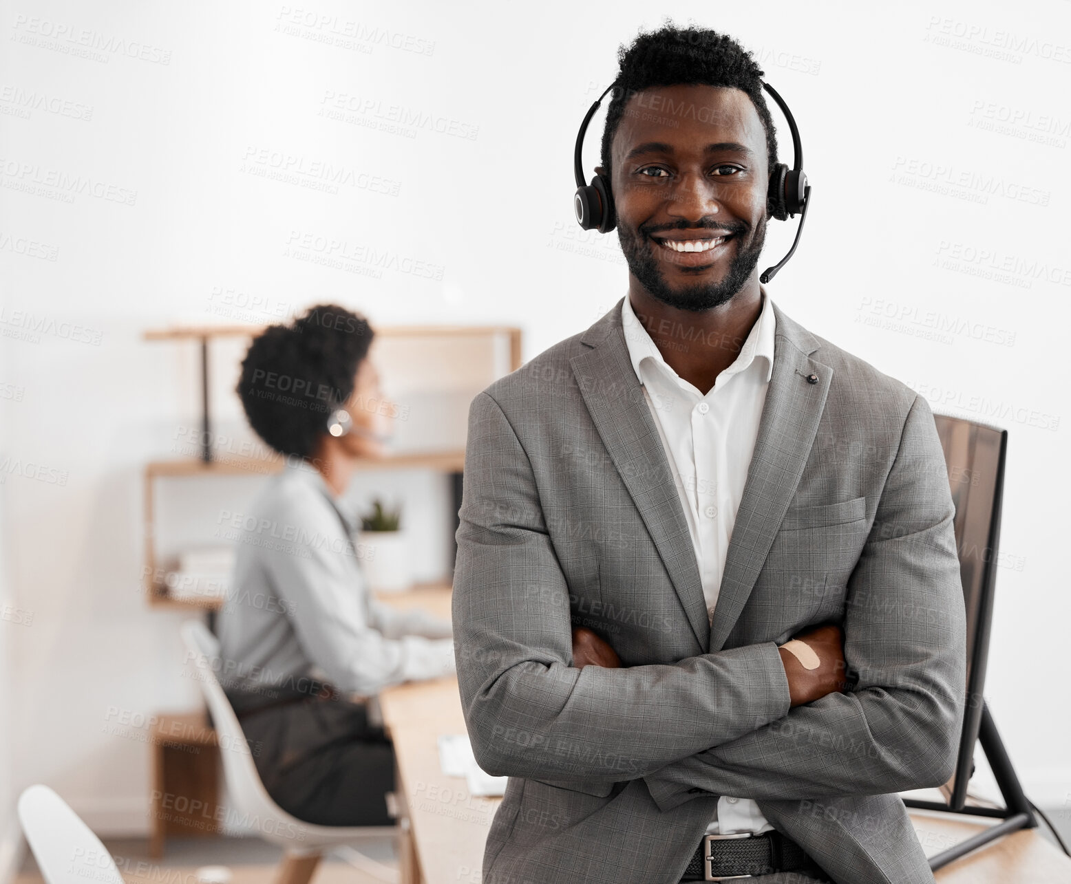 Buy stock photo Call center, customer service and crm consultant wearing headset and looking happy in telemarketing company. Portrait of confident black man in contact us and sales support department for assistance