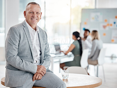 Buy stock photo Portrait, happy business man or ceo in office on table for motivation, inspiration and vision with a smile. Boss, leader or executive with plan for innovation, strategy and future success planning.

