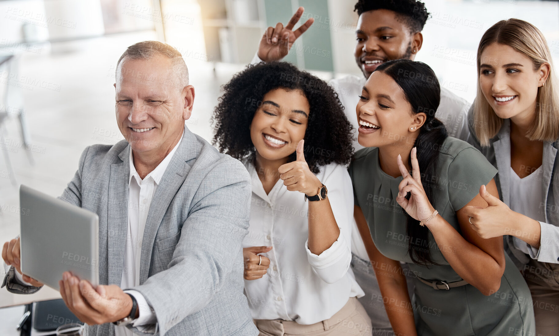 Buy stock photo Startup team, happy and taking a selfie on a tablet with a smile in the office. Diversity, success and an excited ceo having fun with hand signs and celebrating with businessman and women in company