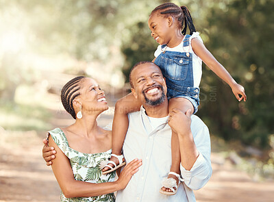 Buy stock photo Family, love and children with a happy mother, father and daughter outside in a park during summer. Mature man and woman bonding and spending time with their cute little girl outdoors in nature