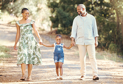 Buy stock photo Black family, love and active parents walking with their child through nature for an adventure and outdoor fun. Happy african man and woman with daughter enjoying travel, vacation and leisure walk