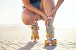 Roller skate, foot injury and woman athlete check feet and ankle sports pain in summer. Exercise, fitness and skating training muscle sprain accident of a female on a workout with a bright background