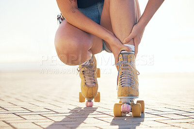 Buy stock photo Roller skate, foot injury and woman athlete check feet and ankle sports pain in summer. Exercise, fitness and skating training muscle sprain accident of a female on a workout with a bright background