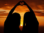 Love, freedom and couple silhouette of lesbian and lgbt pride with hand heart sign at sunset. Women celebrate their relationship, free, in love and proud. Females celebrating their bond and status  