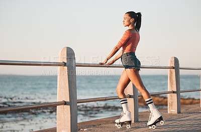 Buy stock photo Summer, roller skate and black woman at beach promenade for fitness freedom, fun exercise and hobby training. Relax, calm and sunshine nature with young skating culture, cool urban girl and sea youth