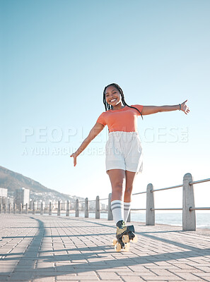Buy stock photo Summer, beach and roller skate woman with happy, relax and calm smile feeling free at the sea. Happiness of a female skater with freedom, movement and fun exercise in the sun in nature by a beach