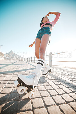 Buy stock photo Girl relax while roller skating, travel or journey on sidewalk for fitness, health and training exercise with flare. Woman on fun city adventure traveling on roller blades for workout bottom view