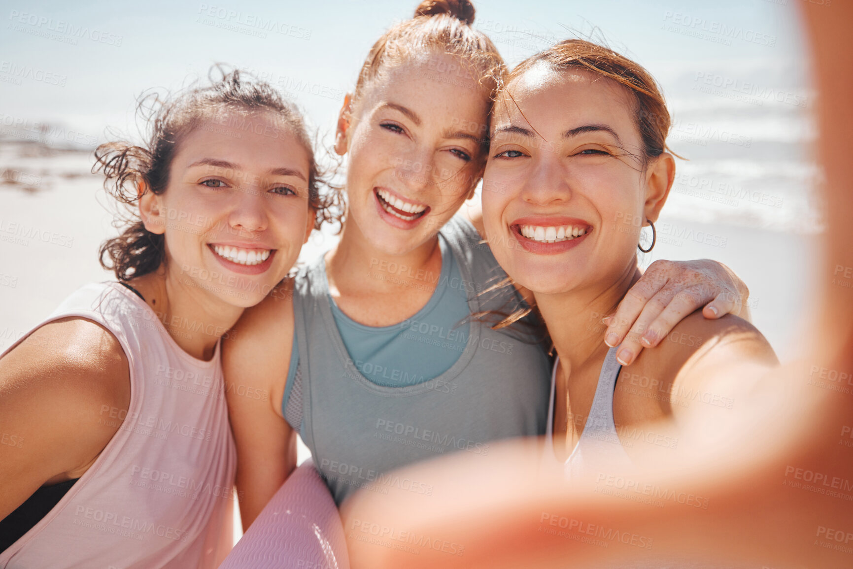 Buy stock photo Happy and sport friends selfie at the beach after workout, exercise or training yoga class or pilates. Portrait of smile, fitness or cheerful women bonding, having fun and standing at the ocean