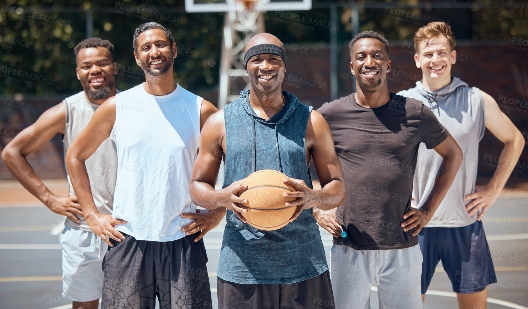 Buy stock photo Portrait, basketball and team on sports court training for a competition, game or match with a smile. Workout, athletes and diverse picture of group playing sport for health, fitness and wellness.

