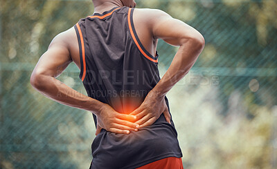 Buy stock photo Athletic, fit man with lower back pain, outdoors hold and massages tired and strain muscles or spinal injury. Muscular black man with cramps, inflammation or burning and sore muscle seeking relief.