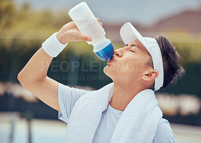 Buy stock photo Asian man drinking water, fitness and relax after a training session, workout or exercise. Athlete, health and sports male resting with refreshing liquid after playing a sport, cardio or running.
