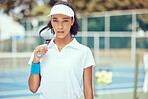 Professional black woman tennis player, fitness athlete and sports court playing, match and game with racket outdoors. Portrait of competitive, motivation and focus person ready for workout training