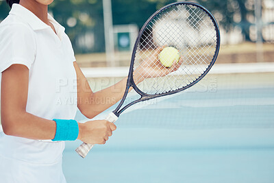 Tennis ball, racket and woman ready to serve during training on sports court for fitness, exercise and health. Fit payer, competition and match with young female playing game for an active lifestyle