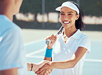 Tennis, handshake and teamwork with a player and coach shaking hands on a sports court before a game or match. Fitness, workout and training with a woman athlete saying thank you to her trainer