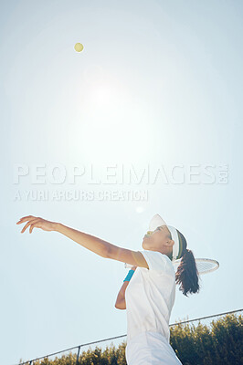 Buy stock photo Tennis court, outdoor girl and ball in sky after professional hit  with sports racket in match. Woman champion, competition and talented and fit athlete person with expert game play technique.