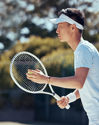 Buy stock photo Tennis player, sports game and Asian man training for sport competition on court, motivation for fitness exercise and strong for game in nature. Japanese athlete ready playing in professional event