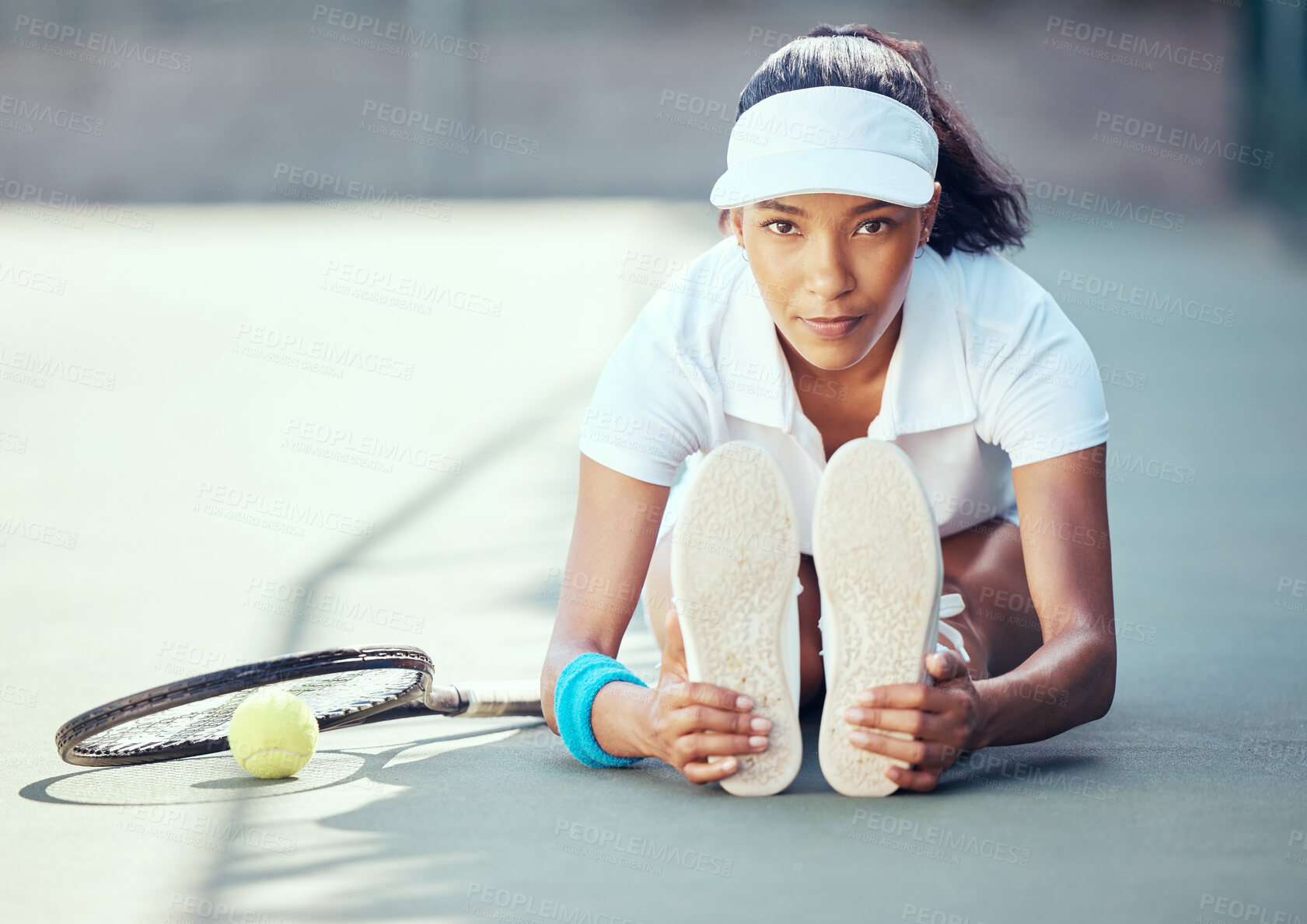 Buy stock photo Tennis, sport and exercise with a woman stretching to warmup before a game or match on an outdoor court. Health fitness and sports with a female player getting ready for a workout and practice