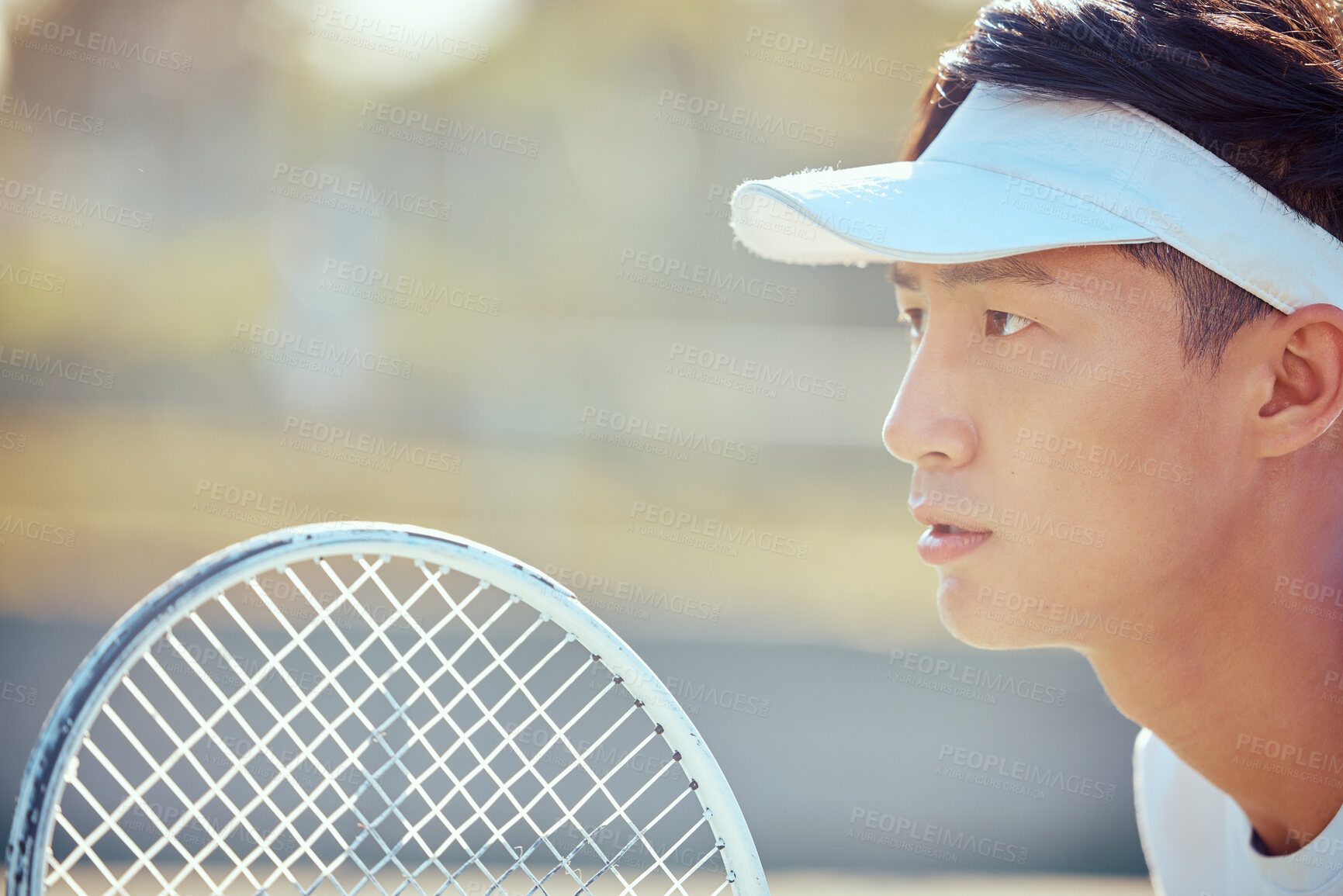 Buy stock photo Tennis, sports and exercise focus of a Asian man athlete in a sport, training or fitness game. Player from Japan with a competitive mindset feeling healthy, strong and ready to start a workout match
