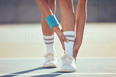 Buy stock photo Tennis athlete with ankle injury, pain and hurt on a court after training, workout or practice outdoor. Professional sport person with accident after fitness exercise, game or match at a sports club