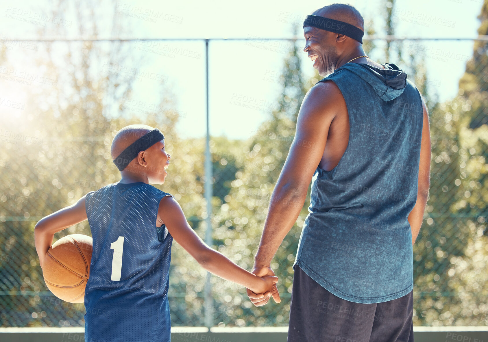 Buy stock photo Basketball, family and sport with a dad and son training on a court outside for fitness and fun. Children, exercise and workout with a father and boy playing basket ball for health and recreation