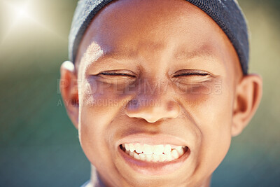 Buy stock photo Children, face and teeth with a black boy outside with a big smile and eyes closed. Kids, head and joy with a carefree little male child standing outdoors alone with flare and a positive expression