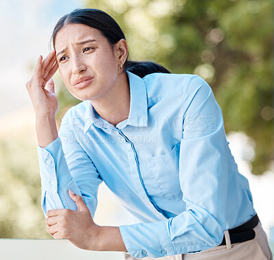 Buy stock photo Stress, anxiety and headache by woman employee suffering with pain, unhappy and holding her head outdoors. Young corporate worker looking exhausted, experience burnout and pressure at the workplace