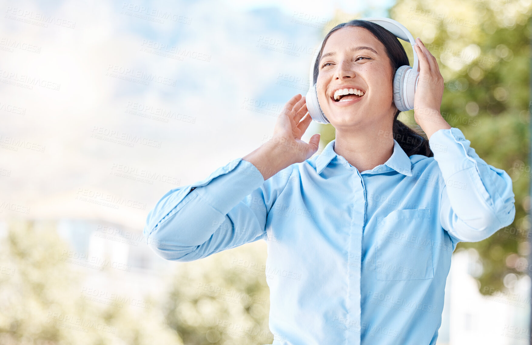 Buy stock photo Woman with headphones happy listening to music on mp3 audio streaming song app singing to popular singer artist. Girl or young person smile, happiness and dancing to good internet joy and fun radio