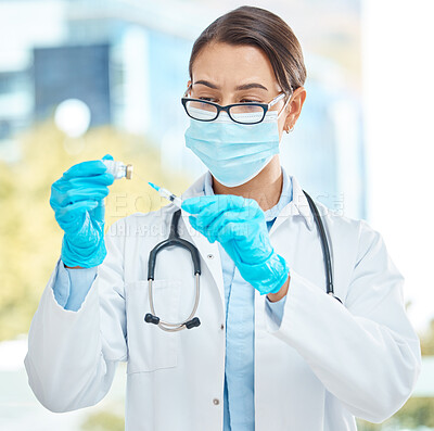 Buy stock photo Medical, healthcare and covid vaccine by woman doctor working during corona pandemic in a hospital. Young health care worker holding medical innovation, confident while prepare cure injection