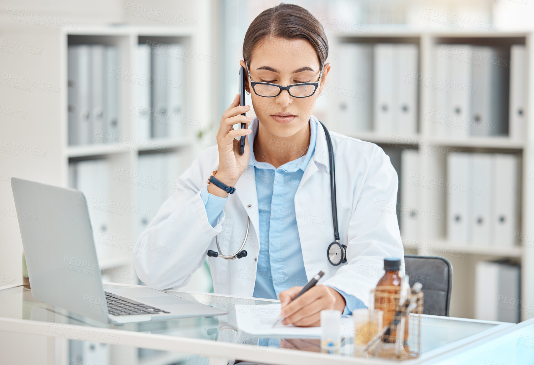 Buy stock photo Doctor planning insurance, phone communication about health and writing strategy for work schedule in office at hospital. Medical nurse in healthcare discussion on call and working at clinic