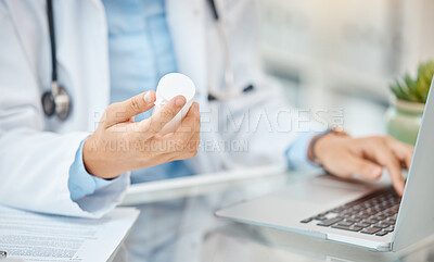 Buy stock photo Pharmacist or doctor with prescription medicine bottle and laptop working on pills medical healthcare research. Hands of man cardiologist or professional pharmacy expert typing in antibiotics results