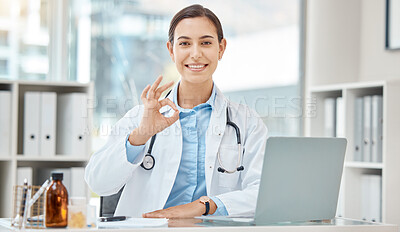 Buy stock photo Ok hand sign, women doctor or laptop in hospital for medical, healthcare insurance or surgery approval. Portrait of smile, happy or motivation medicine employee with okay gesture for success research