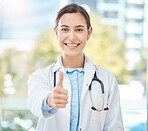 Yes, doctor success and thank you thumbs up of a woman with a winner, happy and support hand sign. Portrait of a medical, healthcare and clinic worker with a smile with a job achievement gesture