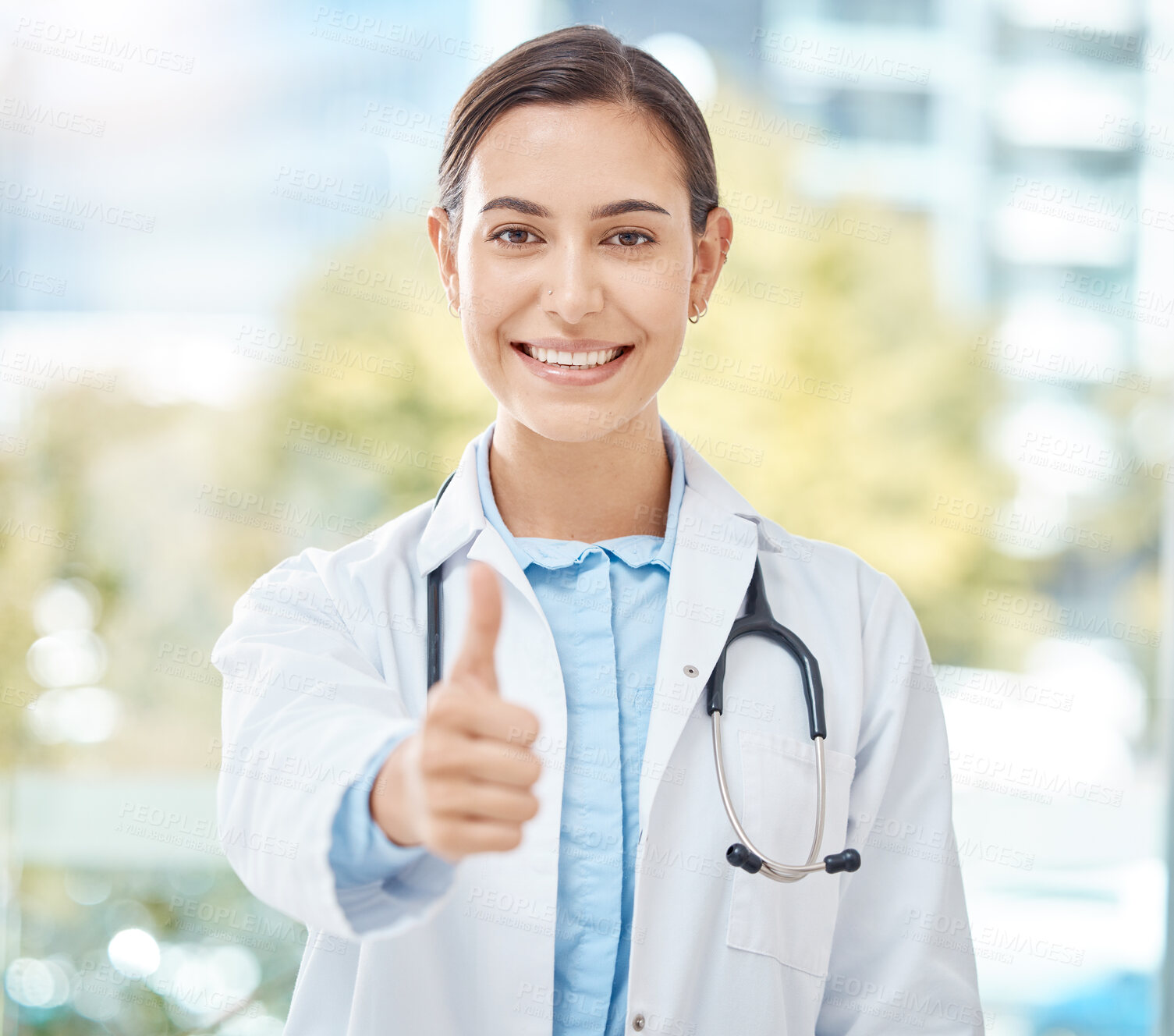 Buy stock photo Yes, doctor success and thank you thumbs up of a woman with a winner, happy and support hand sign. Portrait of a medical, healthcare and clinic worker with a smile with a job achievement gesture