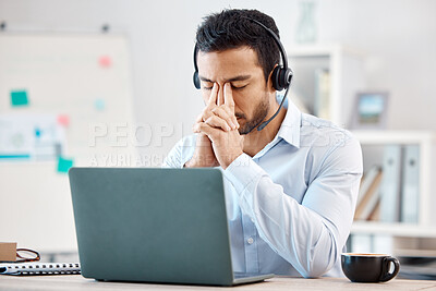 Buy stock photo Stress, headache and depression of call center agent feeling overwhelmed, upset and frustrated while wearing headset and using laptop at desk.  Male crm, telemarketing and customer support operator