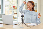 Podcaster, presenter or blogger dancing and having fun to music while recording a podcast talking over a microphone for her talk show. Funny radio host using audio equipment doing a live broadcast