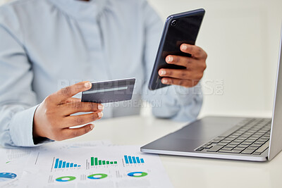Buy stock photo Finance, accounting and trading with a businessperson using a phone and credit card in her hands and a graph on the desk. Fintech, investment and banking with a female employee managing money online 