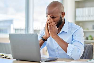 Buy stock photo Stress, anxiety and tired businessman with a laptop suffering from burnout while frustrated, fail and mistake in the office. Entrepreneur suffering from headache with a deadline working at a desk