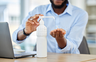 Buy stock photo Covid, hand sanitizer or black businessman with laptop cleaning bacteria, virus or stop to global healthcare crisis. Zoom on hands, security or safety in company office by research employee or worker