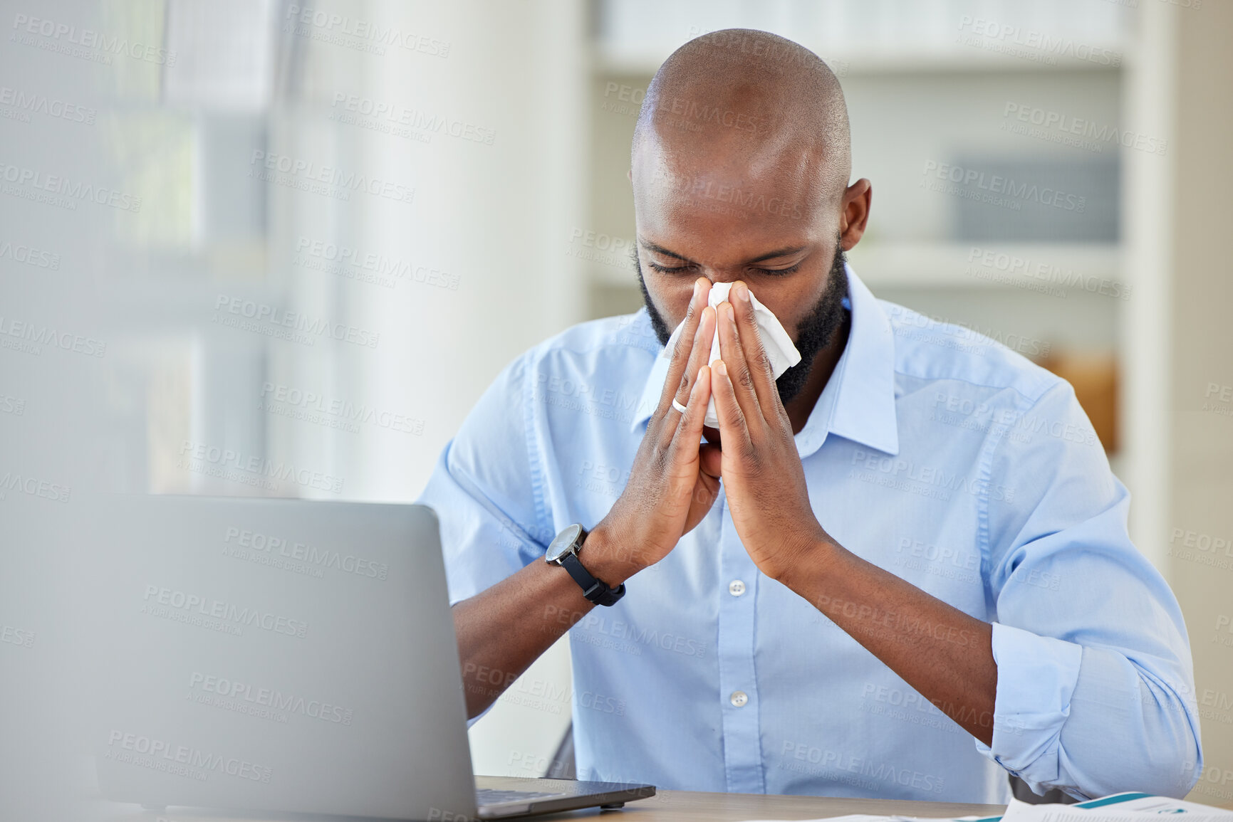 Buy stock photo Covid, flu and healthcare virus for black businessman with laptop in office, company or creative startup. Medical burnout, allergy or sick worker, desk employee or entrepreneur blowing nose on tissue