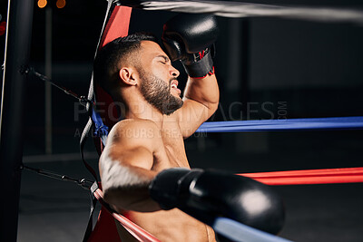 Buy stock photo Tired boxer, fitness and sports competition in boxing ring, relax during mma fight and breathing after wellness exercise training at gym. Frustrated Muay Thai athlete without energy for workout